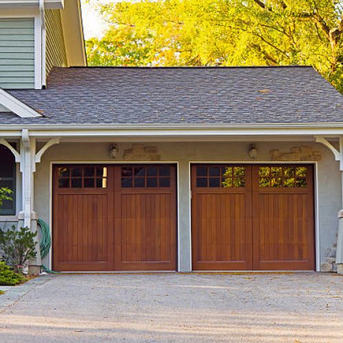 Two wooden car garage residence Two wooden car garage residence